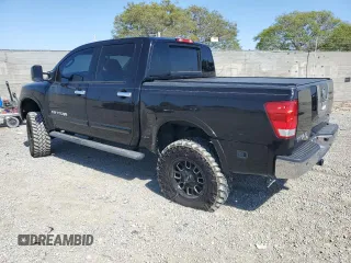 2011 Nissan Titan SL with VIN 1N6BA0EC4BN319994, listed as a Copart auction lot 55088175 with 103,008 mi miles and Salvage title. Bid and sale history available at DreamBid. Image 2.