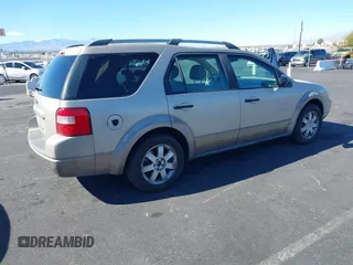 2005 Ford Freestyle SE with VIN 1FMZK01185GA43892, listed as a IAAI auction lot 41643495 with 183,896 mi miles. Bid and sale history available at carsss.com. Image 4.