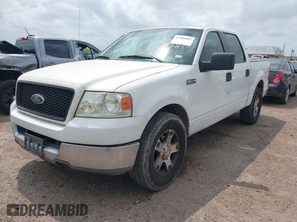 2004 Ford F-150 XLT with VIN 1FTPW12534KD74981, listed as a IAAI auction lot 42086802 with 323,592 mi miles. Bid and sale history available at carsss.com. Image 2.