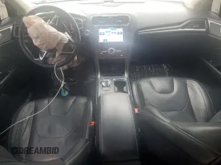 2019 Ford Fusion Titanium with VIN 3FA6P0K9XKR217324, listed as a Copart auction lot 56104185 with 135,728 mi miles and Salvage title. Bid and sale history available at DreamBid. Image 8.