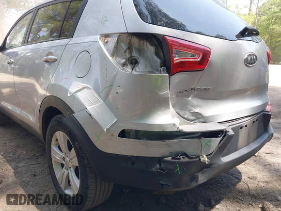 2012 Kia Sportage LX with VIN KNDPB3A22C7342085, listed as a IAAI auction lot 42313425 with 112,005 mi miles and . Bid and sale history available at DreamBid. Image 6.