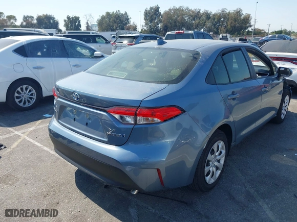 2024 Toyota Corolla Hybrid LE with VIN JTDBCMFE5RJ030239, listed as a IAAI auction lot 40489207 with 5,295 mi miles. Bid and sale history available at carsss.com. Image 4.