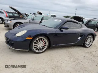 2006 Porsche Cayman S с VIN WP0AB29836U781164, выставлен на аукционе Copart как лот 74904904 с пробегом 130 705 миль миль и Списание • Salvage title. История ставок и продаж доступна на DreamBid. Изображение 1.