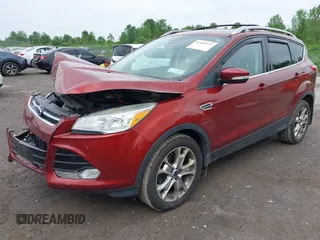 2015 Ford Escape Titanium z VIN 1FMCU9J98FUC84963, wystawiony jako IAAI lot #42469112 z przebiegiem 128 838 mil mil oraz . Historia ofert i sprzedaży dostępna na DreamBid. Obrazek 17.