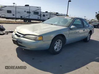 1997 Ford Thunderbird LX с VIN 1FALP6241VH161841, выставлен на аукционе Copart как лот 62095805 с пробегом 268 803 миль миль и Списание • Salvage title. История ставок и продаж доступна на DreamBid. Изображение 1.