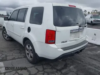 2014 Honda Pilot EX-L with VIN 5FNYF3H54EB003916, listed as a IAAI auction lot 41518679 with 147,456 mi miles. Bid and sale history available at carsss.com. Image 3.