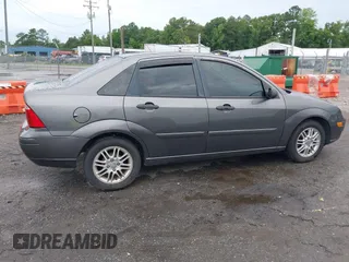 2007 Ford Focus S with VIN 1FAFP34N97W111639, listed as a IAAI auction lot 39914681 with 193,895 mi miles. Bid and sale history available at carsss.com. Image 13.
