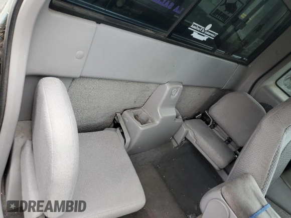 1999 Ford Ranger XL with VIN 1FTYR14V6XPA93323, listed as a Copart auction lot 59769985 with 345,075 mi miles and Salvage title. Bid and sale history available at DreamBid. Image 10.