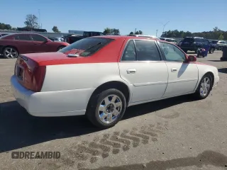 2002 Cadillac DeVille DTS with VIN 1G6KF57942U231877, listed as a Copart auction lot 76724554 with 180,082 mi miles and Salvage Title. Bid and sale history available at carsss.com. Image 3.