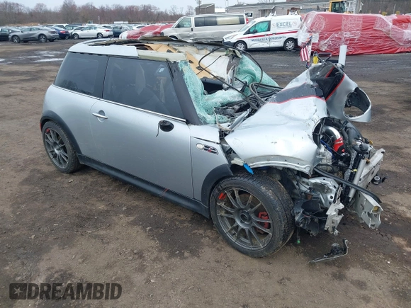 2006 MINI Hardtop S with VIN WMWRE33546TL23876, listed as a IAAI auction lot 41858060 with 146,359 mi miles and . Bid and sale history available at DreamBid. Image 1.