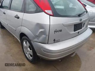 2004 Ford Focus with VIN 3FAFP37Z54R127432, listed as a IAAI auction lot 41586056 with 159,927 mi miles and . Bid and sale history available at DreamBid. Image 6.