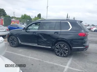 2020 BMW X7 xDrive40i z VIN 5UXCW2C03L9A00546, wystawiony jako IAAI lot #42057736 z przebiegiem 65 121 mil mil oraz . Historia ofert i sprzedaży dostępna na DreamBid. Obrazek 14.