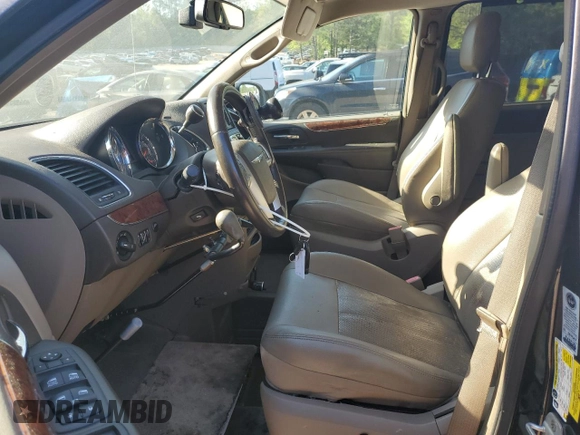 2012 Chrysler Town & Country Touring L with VIN 2C4RC1CG1CR193122, listed as a Copart auction lot 49162105 with 166,223 mi miles and Salvage Title. Bid and sale history available at DreamBid. Image 7.