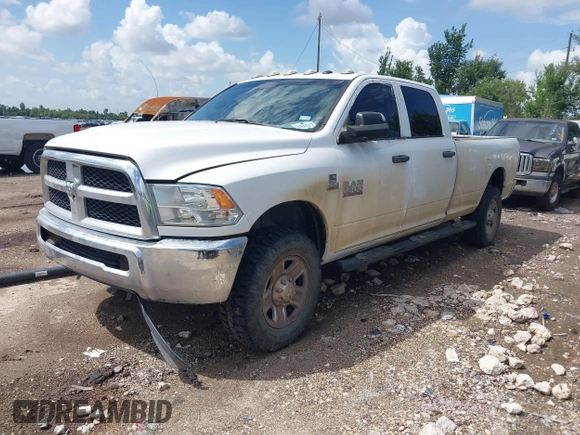 2018 Ram 2500 Tradesman z VIN 3C6UR5HJ5JG284053, wystawiony jako IAAI lot #42672148 z przebiegiem 158 783 mil mil oraz . Historia ofert i sprzedaży dostępna na DreamBid. Obrazek 2.