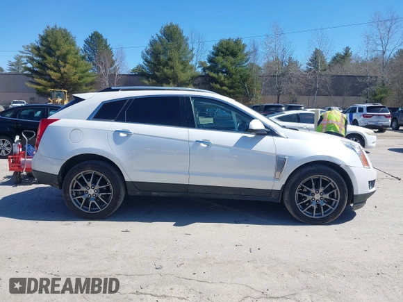 2013 Cadillac SRX Performance Collection with VIN 3GYFNDE33DS637155, listed as a IAAI auction lot 41977706 with 140,668 mi miles and . Bid and sale history available at DreamBid. Image 13.
