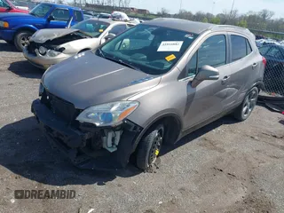 2014 Buick Encore with VIN KL4CJASB4EB783635, listed as a IAAI auction lot 41816882 with 134,758 mi miles. Bid and sale history available at carsss.com. Image 2.