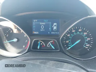 2014 Ford Escape SE with VIN 1FMCU9GX0EUE12195, listed as a IAAI auction lot 42674879 with 96,576 mi miles and . Bid and sale history available at DreamBid. Image 7.