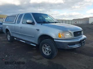 1998 Ford F-150 z VIN 2FTZX18W5WCA42375, wystawiony jako IAAI lot #41724649 z przebiegiem 71 034 mil mil oraz . Historia ofert i sprzedaży dostępna na DreamBid. Obrazek 1.
