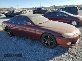 1997 Lexus SC 300 z VIN JT8CD32Z1V0040141, wystawiony jako Copart lot #85372924 z przebiegiem Nie podano mil oraz Szkody całkowita. Historia ofert i sprzedaży dostępna na DreamBid. Obrazek 4.