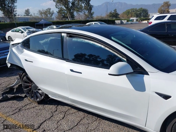 2022 Tesla Model 3 Performance with VIN 5YJ3E1EC4NF179188, listed as a IAAI auction lot 40487457 with 37,979 mi miles. Bid and sale history available at carsss.com. Image 12.