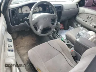 2002 Toyota Tacoma z VIN 5TEWN72N42Z895430, wystawiony jako Copart lot #57458155 z przebiegiem Nie podano mil oraz Szkoda całkowita • Salvage title. Historia ofert i sprzedaży dostępna na DreamBid. Obrazek 8.