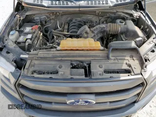 2016 Ford F-150 XLT with VIN 1FTFW1EF4GKF79990, listed as a Copart auction lot 57616395 with 118,510 mi miles and Salvage title. Bid and sale history available at DreamBid. Image 11.