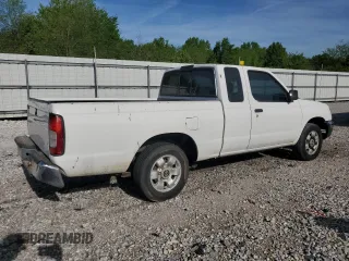 1999 Nissan Frontier XE with VIN 1N6DD26S4XC319806, listed as a Copart auction lot 54233635 with 311,759 mi miles and Clean title. Bid and sale history available at DreamBid. Image 3.