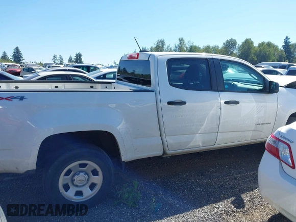 2021 Chevrolet Colorado 4WD Work Truck with VIN 1GCGTBEN0M1233723, listed as a IAAI auction lot 42600025 with 58,906 mi miles and . Bid and sale history available at DreamBid. Image 13.