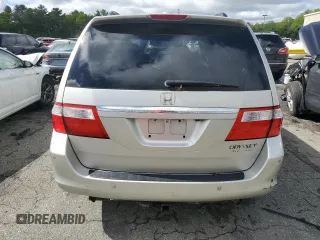 2005 Honda Odyssey Touring z VIN 5FNRL38835B071258, wystawiony jako Copart lot #57878295 z przebiegiem 143 474 mil mil oraz Szkoda całkowita • Salvage title. Historia ofert i sprzedaży dostępna na DreamBid. Obrazek 6.