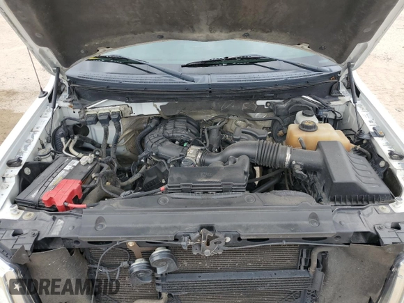 2012 Ford F-150 XL with VIN 1FTMF1EM5CKD32042, listed as a Copart auction lot 70772444 with 138,127 mi miles and Salvage title. Bid and sale history available at DreamBid. Image 11.