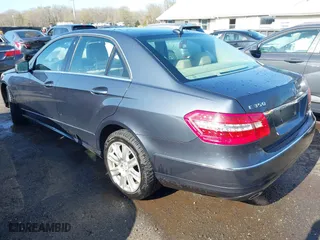 2013 Mercedes-Benz E-Class E 350 Luxury with VIN WDDHF8JB0DA707640, listed as a IAAI auction lot 41916454 with 104,469 mi miles. Bid and sale history available at carsss.com. Image 3.