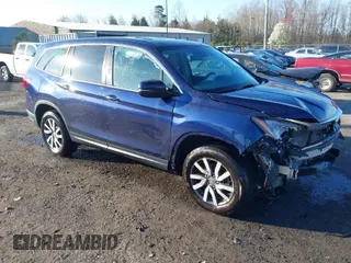 2019 Honda Pilot EX-L with VIN 5FNYF6H55KB024934, listed as a IAAI auction lot 41878656 with 102,129 mi miles. Bid and sale history available at carsss.com. Image 1.