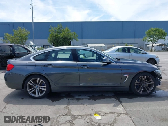 2015 BMW 4 Series 428i with VIN WBA4A5C59FGK15750, listed as a IAAI auction lot 42098856 with 62,530 mi miles and . Bid and sale history available at DreamBid. Image 14.