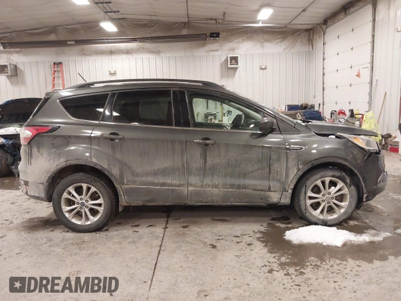 2018 Ford Escape SE with VIN 1FMCU9GD8JUA53114, listed as a IAAI auction lot 41592808 with 167,659 mi miles. Bid and sale history available at carsss.com. Image 13.