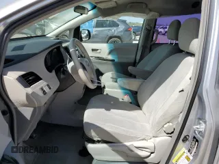 2012 Toyota Sienna with VIN 5TDKA3DC1CS012509, listed as a Copart auction lot 49906955 with 141,745 mi miles and Salvage Title. Bid and sale history available at DreamBid. Image 7.