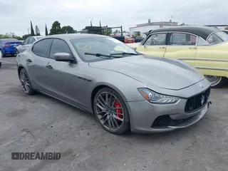 2014 Maserati Ghibli S Q4 z VIN ZAM57RTA8E1126646, wystawiony jako IAAI lot #42190587 z przebiegiem 80 050 mil mil oraz . Historia ofert i sprzedaży dostępna na DreamBid. Obrazek 1.