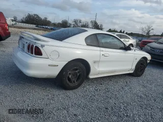 1997 Ford Mustang with VIN 1FALP4044VF174876, listed as a Copart auction lot 41601355 with 103,828 mi miles and Salvage Title. Bid and sale history available at carsss.com. Image 3.