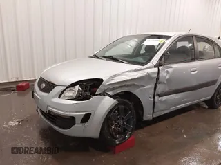 2008 Kia Rio LX with VIN KNADE163186345215, listed as a IAAI auction lot 41776000 with 141,859 mi miles. Bid and sale history available at carsss.com. Image 6.