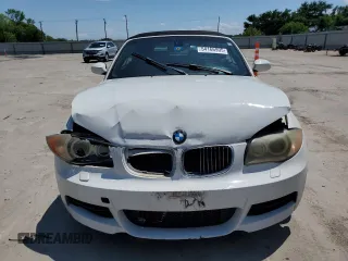 2009 BMW 1 Series 135i with VIN WBAUN93599VK40210, listed as a Copart auction lot 54166905 with 148,899 mi miles and Salvage title. Bid and sale history available at DreamBid. Image 5.