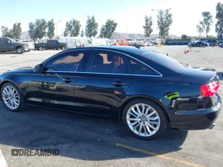 2013 Audi A6 Premium Plus с VIN WAUDFAFC7DN031355, выставлен на аукционе IAAI как лот 40638900 с пробегом 106 774 миль миль и . История ставок и продаж доступна на DreamBid. Изображение 14.