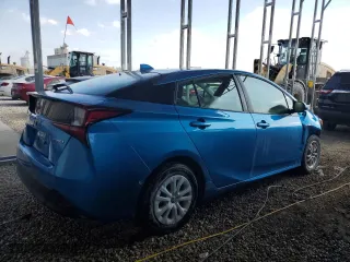 2020 Toyota Prius L Eco with VIN JTDKARFU7L3108218, listed as a Copart auction lot 45026925 with 90,704 mi miles and Salvage Title. Bid and sale history available at carsss.com. Image 3.