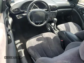 1998 Pontiac Sunfire z VIN 4G2JB32T1WB201350, wystawiony jako Copart lot #53074805 z przebiegiem 128 486 mil mil oraz Szkody całkowita. Historia ofert i sprzedaży dostępna na DreamBid. Obrazek 8.