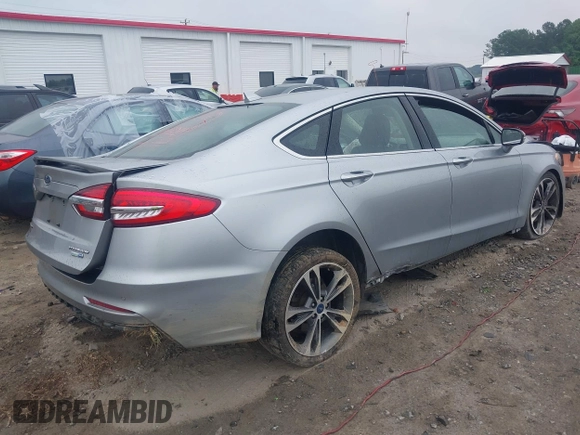 2020 Ford Fusion Titanium with VIN 3FA6P0D99LR138127, listed as a IAAI auction lot 42439024 with 128,792 mi miles and . Bid and sale history available at DreamBid. Image 4.
