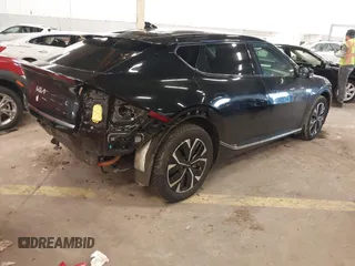 2022 Kia EV6 Wind z VIN KNDC3DLC8N5075492, wystawiony jako IAAI lot #41671331 z przebiegiem 22 122 mil mil oraz . Historia ofert i sprzedaży dostępna na DreamBid. Obrazek 4.