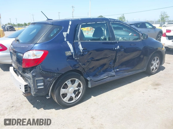 2009 Toyota Matrix with VIN 2T1KU40E99C119135, listed as a IAAI auction lot 42136716 with 185,155 mi miles. Bid and sale history available at carsss.com. Image 4.
