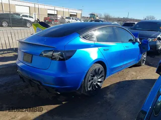 2022 Tesla Model 3 Performance z VIN 5YJ3E1EC9NF337945, wystawiony jako IAAI lot #41419561 z przebiegiem Nie podano mil oraz . Historia ofert i sprzedaży dostępna na DreamBid. Obrazek 4.