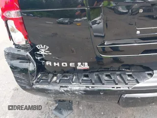 2017 Chevrolet Tahoe LT z VIN 1GNSKBKC8HR311969, wystawiony jako IAAI lot #42126414 z przebiegiem 160 994 mil mil oraz . Historia ofert i sprzedaży dostępna na DreamBid. Obrazek 17.
