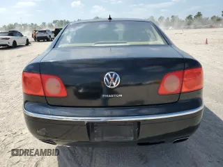 2005 Volkswagen Phaeton z VIN WVWAF03D658003589, wystawiony jako Copart lot #74049134 z przebiegiem 124 506 mil mil oraz Tytuł czysty. Historia ofert i sprzedaży dostępna na DreamBid. Obrazek 6.