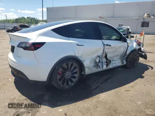 2022 Tesla Model Y Performance with VIN 7SAYGDEF9NF372337, listed as a Copart auction lot 55889345 with 51,099 mi miles and Salvage title. Bid and sale history available at DreamBid. Image 3.