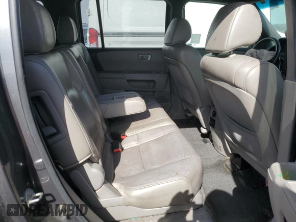 2012 Honda Pilot EX-L z VIN 5FNYF3H6XCB024453, wystawiony jako Copart lot #47358655 z przebiegiem 178 444 mil mil oraz Szkoda całkowita • Salvage title. Historia ofert i sprzedaży dostępna na DreamBid. Obrazek 11.